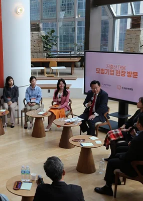 Female entrepreneurs in a discussion circle, looking to create femtech innovations and drive global impact.
