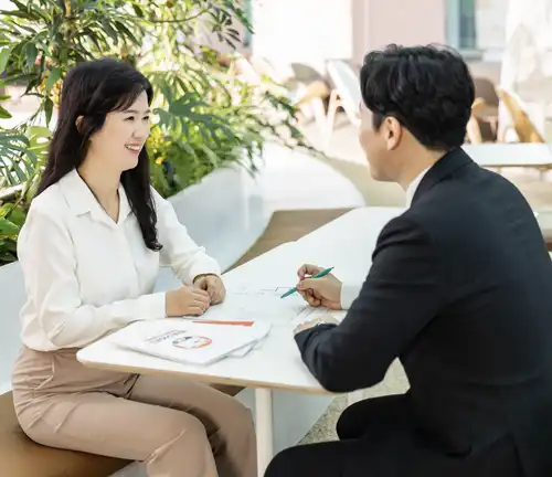 Hanwha General Insurance employees in a meeting