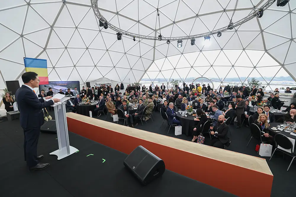 Hanwha Aerospace CEO Hae-il Son addresses attendees at the H-ACE groundbreaking ceremony in Petrești, Romania. 