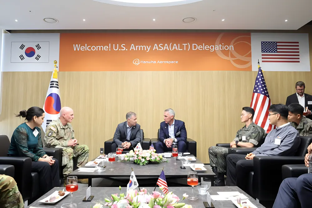 The Honorable Brent G. Ingraham, ASA(ALT), meets with Michael Coulter, CEO of Hanwha Defense USA