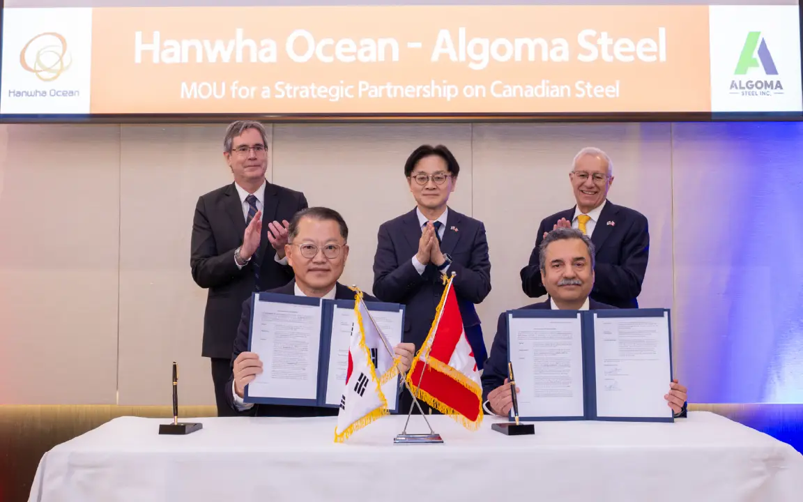 Officials from Hanwha Ocean and Algoma Steel sign a memorandum of understanding